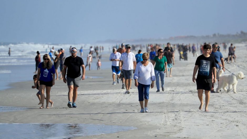 Crowds flock to Jacksonville beaches amid record COVID-19 cases