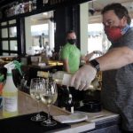 Florida health care worker and 15 of her friends contract coronavirus on first night out at a bar after months of lockdown