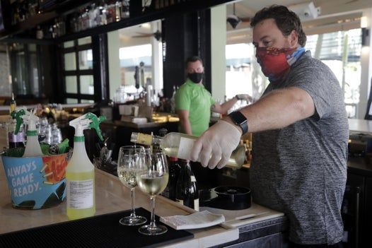Florida health care worker and 15 of her friends contract coronavirus on first night out at a bar after months of lockdown