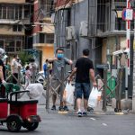 Coronavirus’ return to Beijing disrupts life and rattles nerves