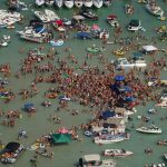 Huge sandbar party on Fourth of July may have spread COVID-19, Michigan officials say