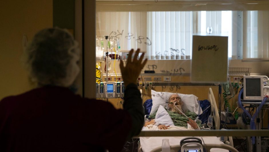 Heartbreaking photos show how frontline nurses treating COVID-19 patients live in the divide between home and the nightmare of the pandemic at work