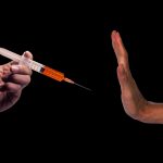 US scientists worry as more say they’ll refuse COVID-19 vaccine
