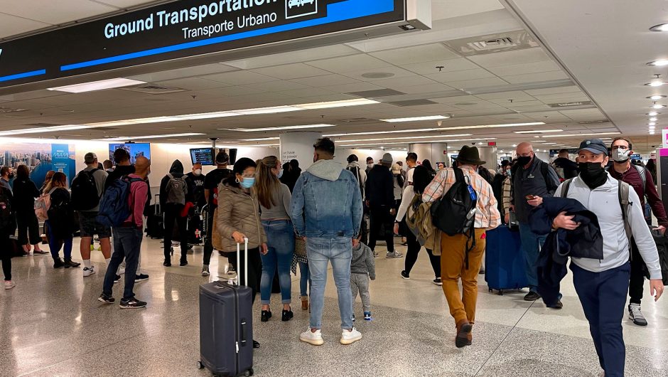 Millions fly over the weekend despite COVID-19 surge, travel warnings