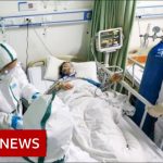 Coronavirus kills 97 in deadliest day so far – BBC News