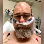 COVID-19 anti-masker issues plea from hospital bed