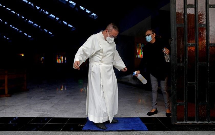 With his mentors dying, a young Catholic priest tries to save his diocese from COVID-19
