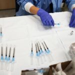 COVID-19 vaccines appear to cause sharp drop in infections in groups of American, Israeli health-care workers