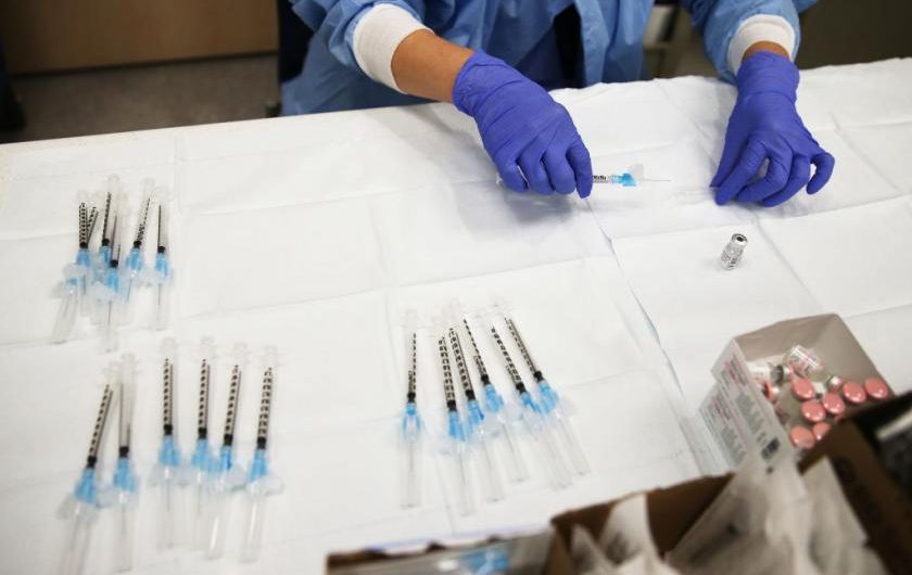 COVID-19 vaccines appear to cause sharp drop in infections in groups of American, Israeli health-care workers