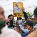 Indonesian cleric gets 4 years for concealing COVID-19 test