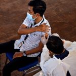 More than 350 Indonesian healthcare workers vaccinated with China’s Sinovac vaccine got COVID-19 and dozens are hospitalized, raising questions about the vaccine’s efficacy on variants
