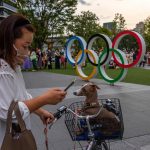 New COVID-19 cases surge in Olympic Village, across Tokyo