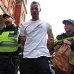 Anti-COVID-19 vaccine mob in London clashes with cops
