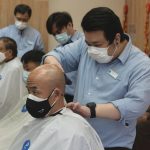 China fights new COVID-19 spike with more selective approach