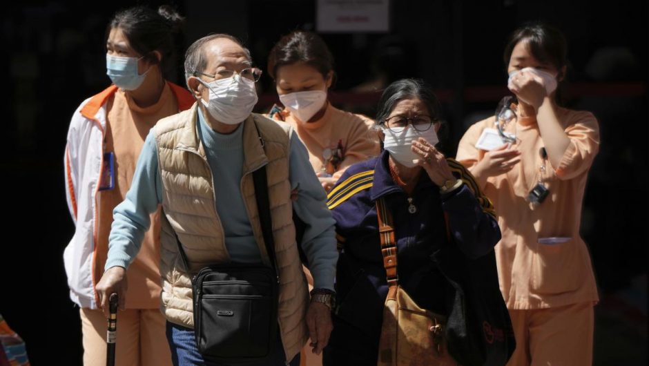 Hong Kong puts mass testing on hold as COVID-19 deaths rise